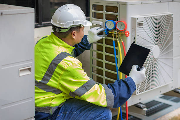 Professional Heat Pump Repair technician working in Woodbine, MD